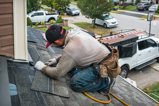 Professional Roof Replacement technician working in Rio, WI
